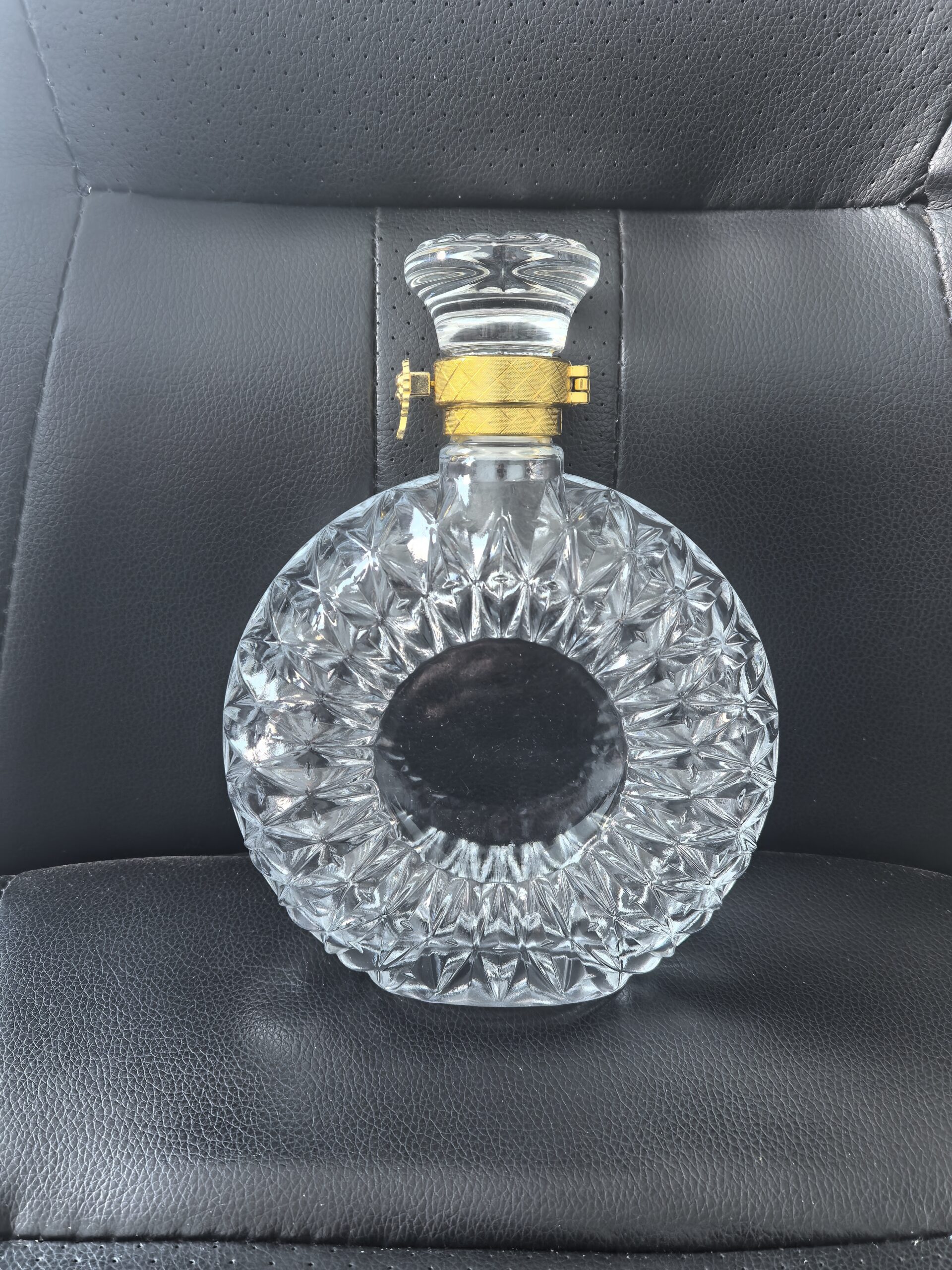 Crystal cut decanter bottle with glass stopper & gold capsule