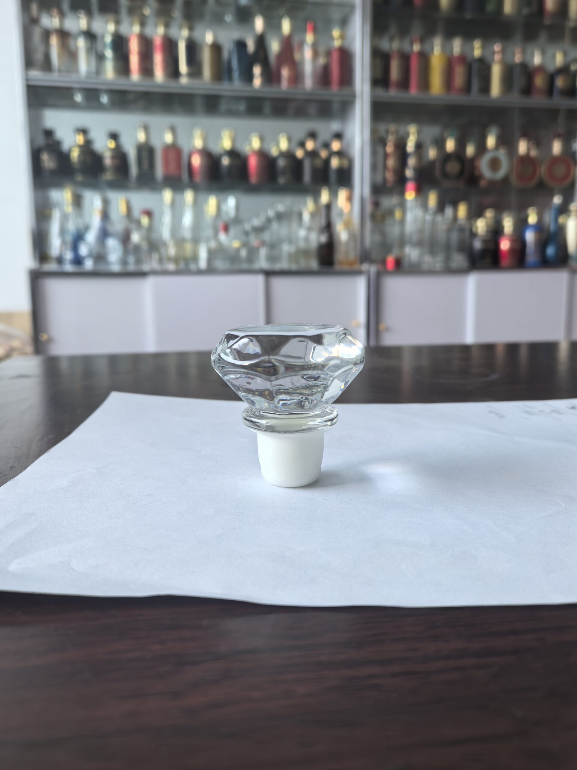 Diamond-top glass stopper with cork base