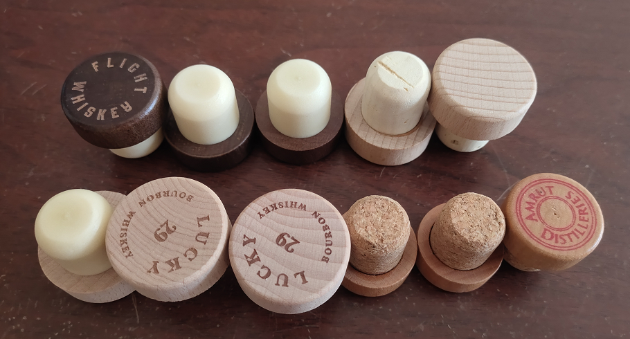 Laser engraved wooden T-corks with customer logos (Flying Misker, Lucky…)