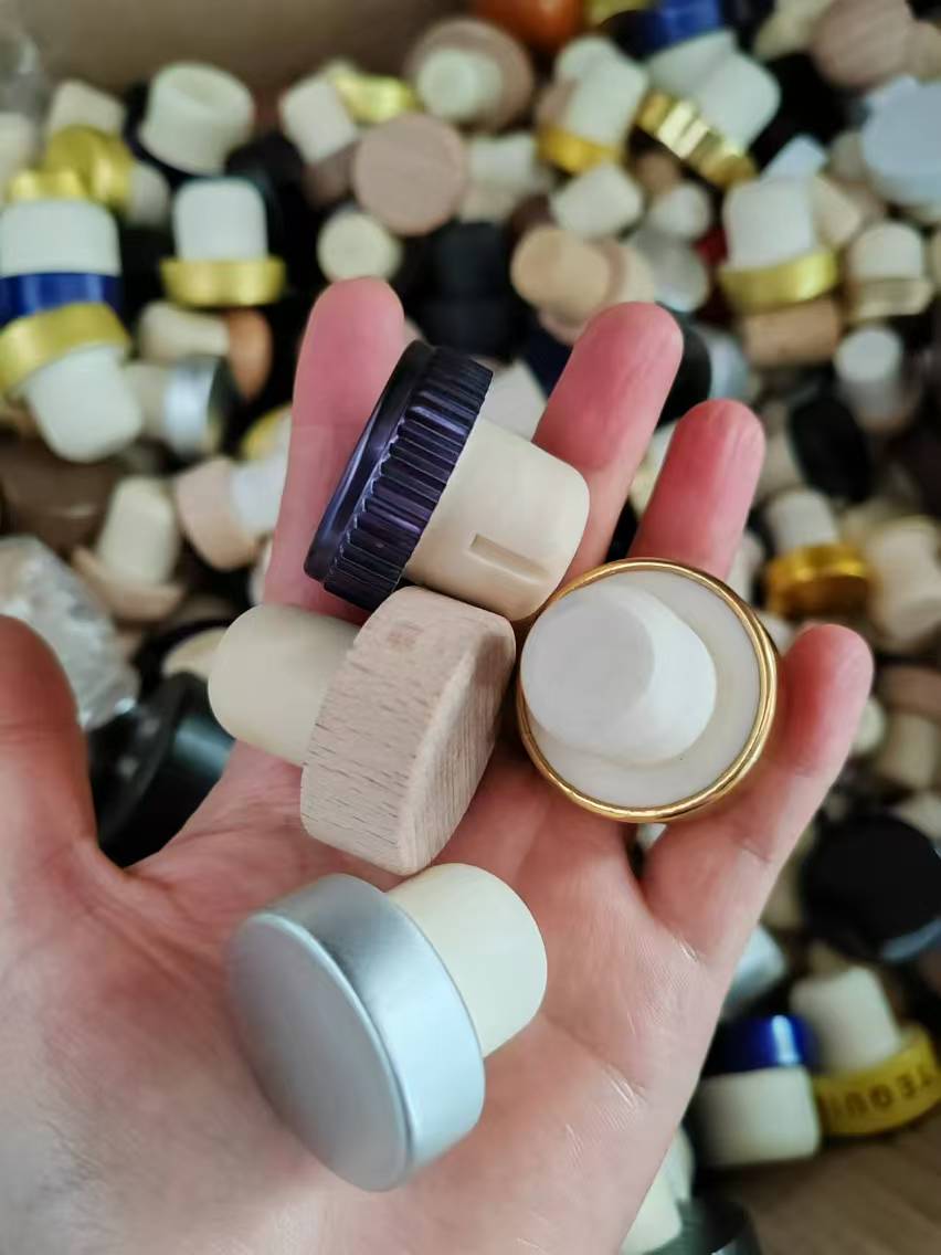 Assorted T-corks: ribbed metal, gold ring, silver and natural wood styles