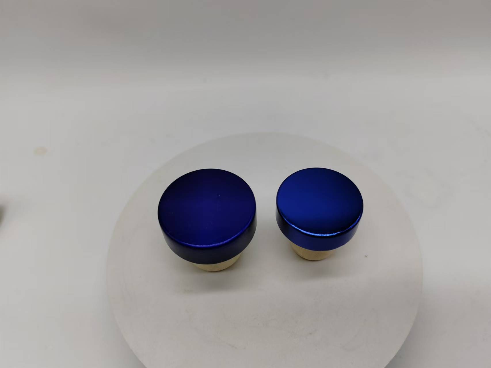 Royal blue aluminum caps in two diameters